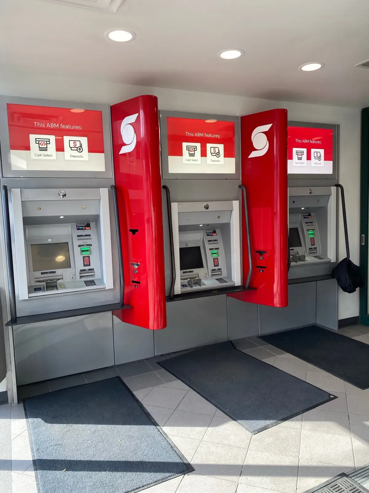 Scotiabank vestibule ATMs with branded surrounds and hand bars